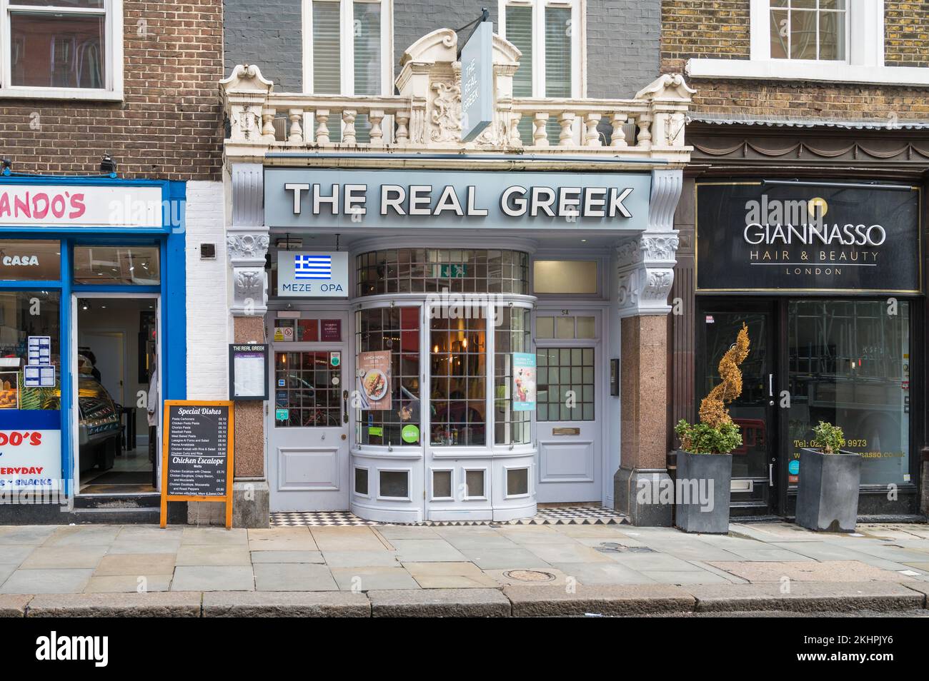Outside facade of The Real Greek, a Greek restaurant on St. Martin`s Lane, Covent Garden, London, England, UK Stock Photo